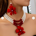 Multi-Layer Faux Pearl Necklace Adorned with a Floral Charm